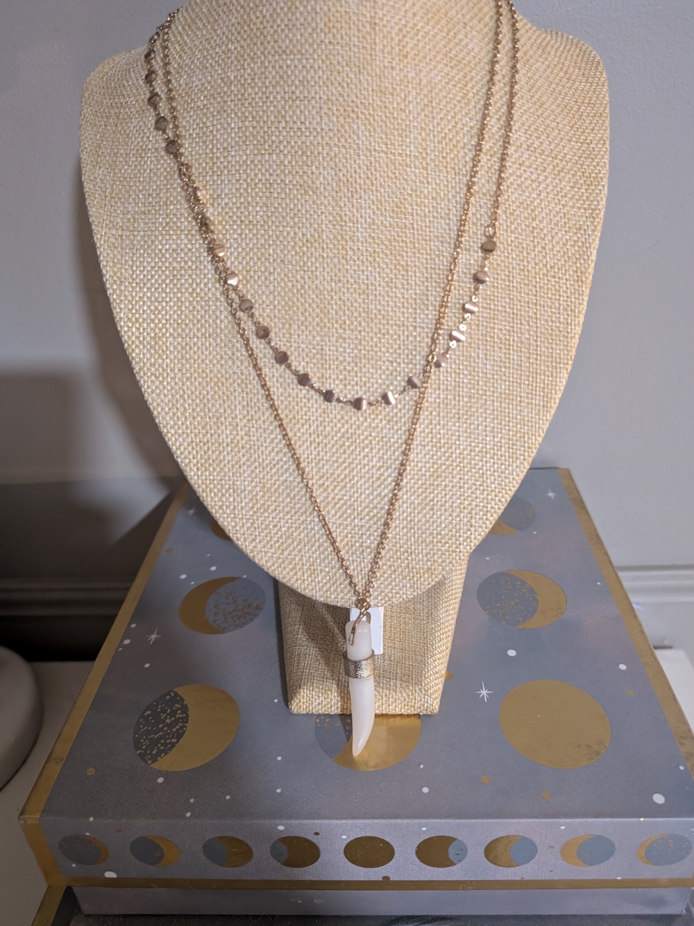 Gold-Tone Layered Necklace with White Horn Pendant